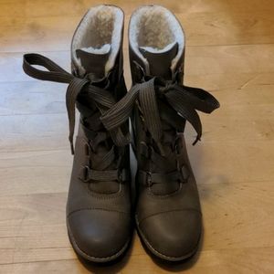 Super cute wedge heel lace up boots.